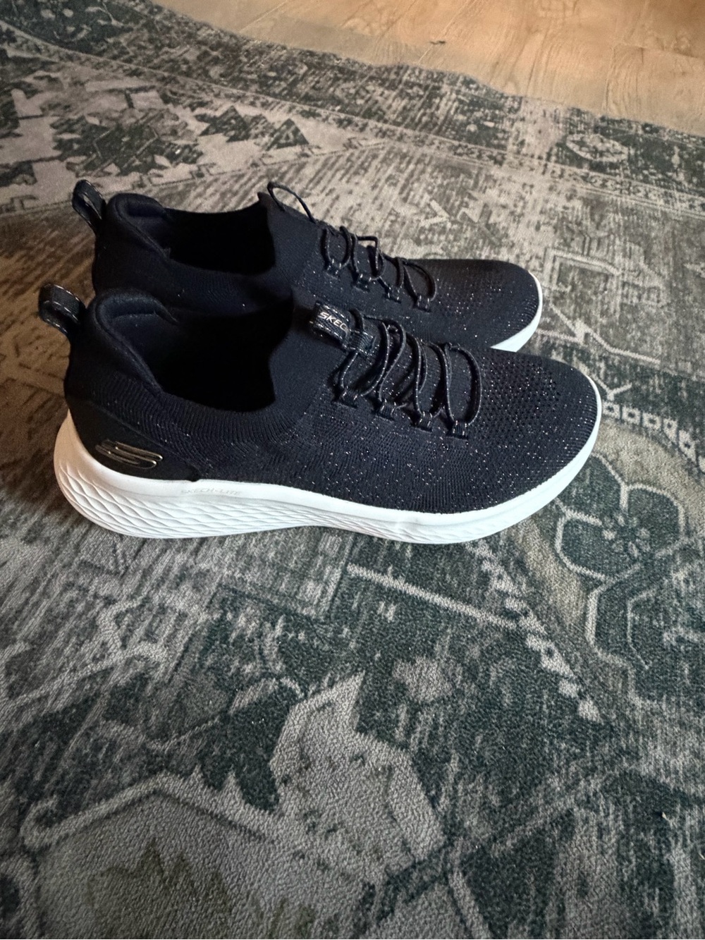 Skechers Women's Skech kite Black Knit Slip-On Sneakers with White Sole